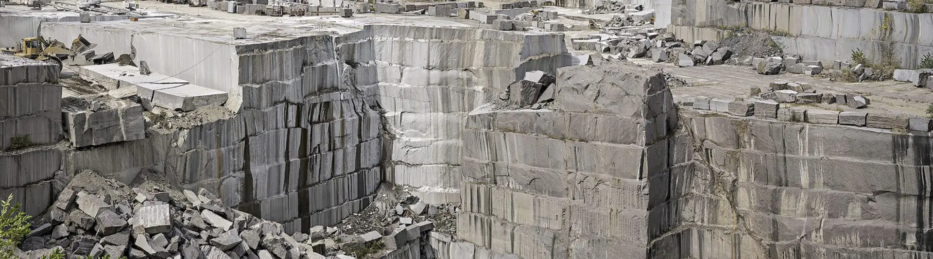 A large stone wall with many blocks of rock.