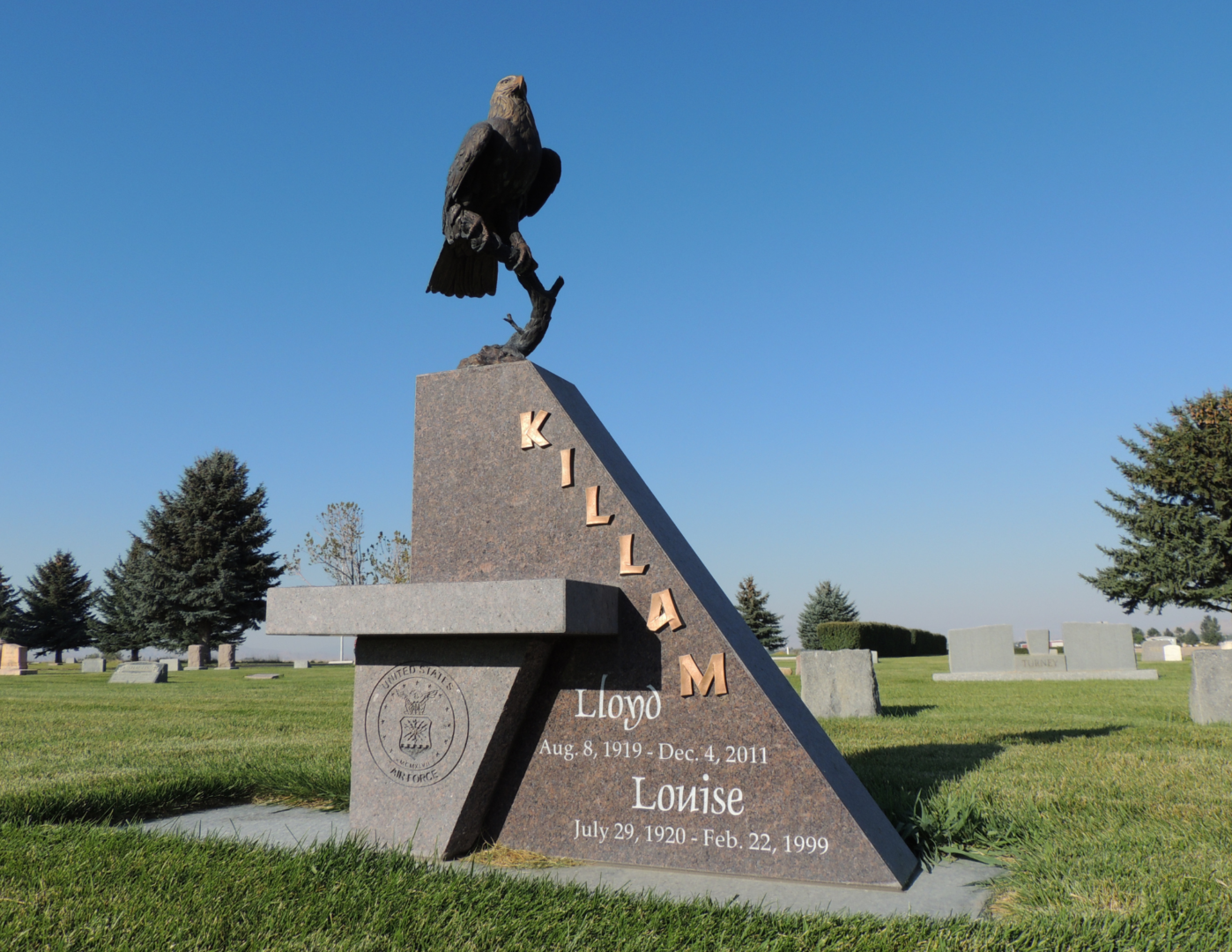 A statue of a person on top of a bench.