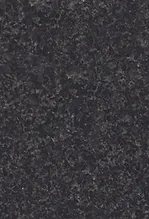 A black granite surface with some small spots.