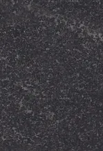 A black granite surface with some small spots.