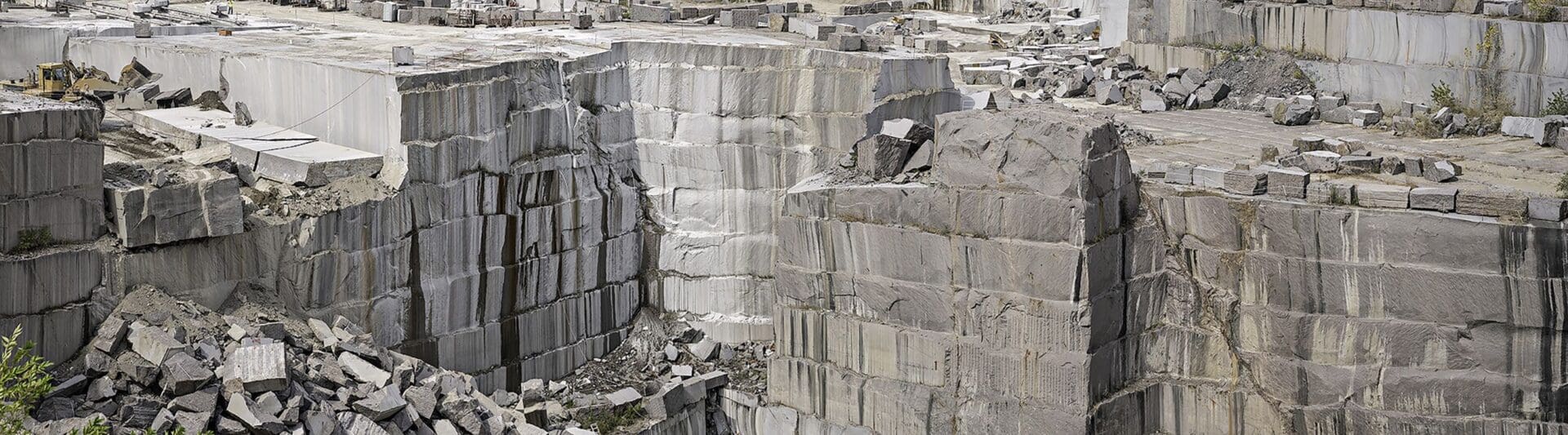 A large stone wall with many blocks of rock.