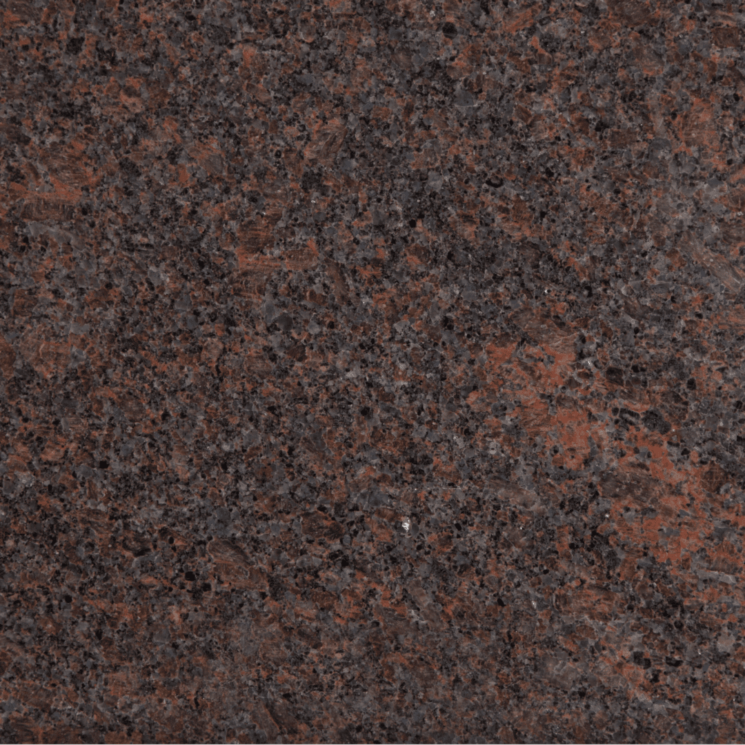 A brown granite surface with some small spots.
