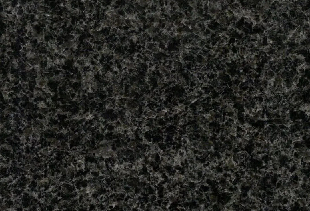 A black granite surface with some small spots