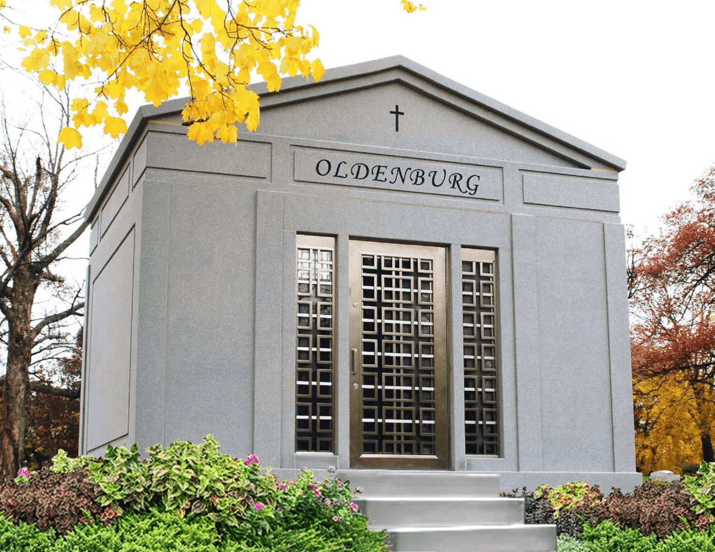 A building with a cross on the front of it.