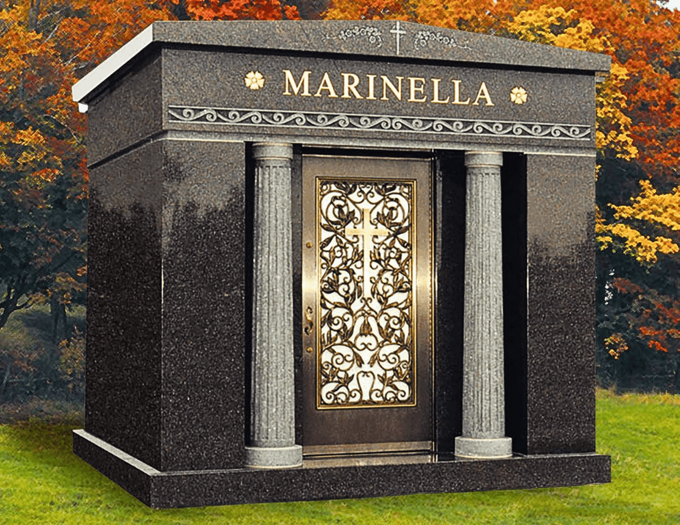 A black marble grave with gold and silver decoration.